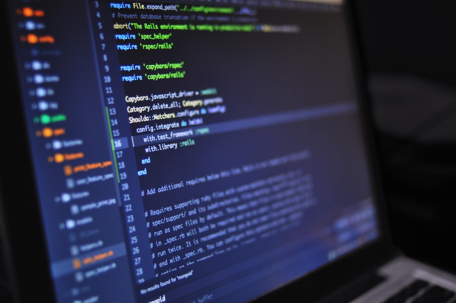 Laptop screen showing source code